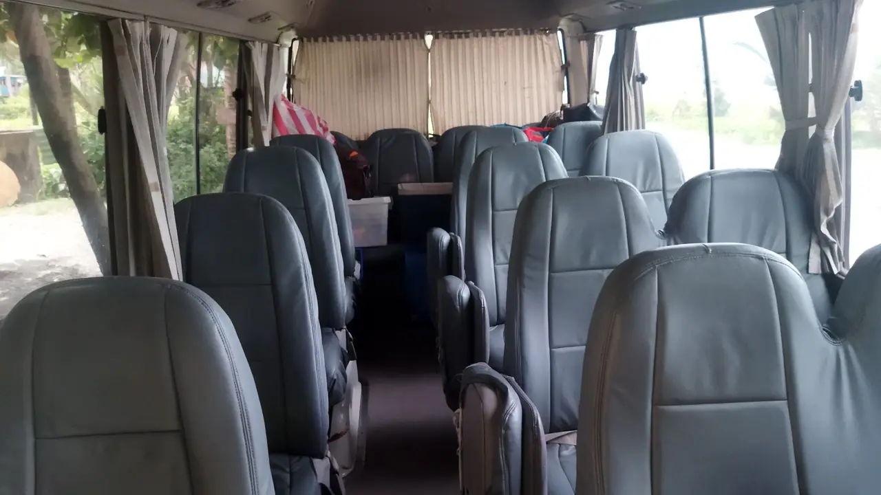 Comfortable passenger seating inside a coaster